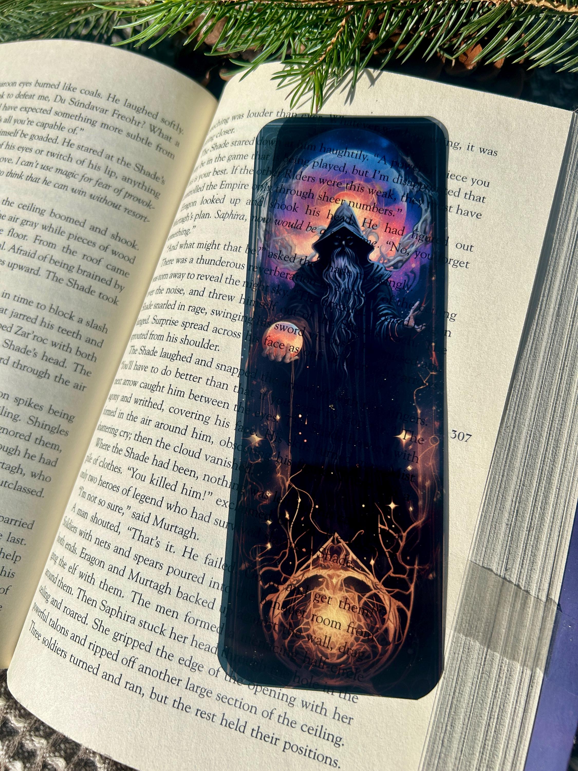 Dark Sorcerer Bookmark Gothic Fantasy Wizard Design with Glowing Orb, Mysterious Cloaked Figure in Hooded Robes, Transparent Bookmark