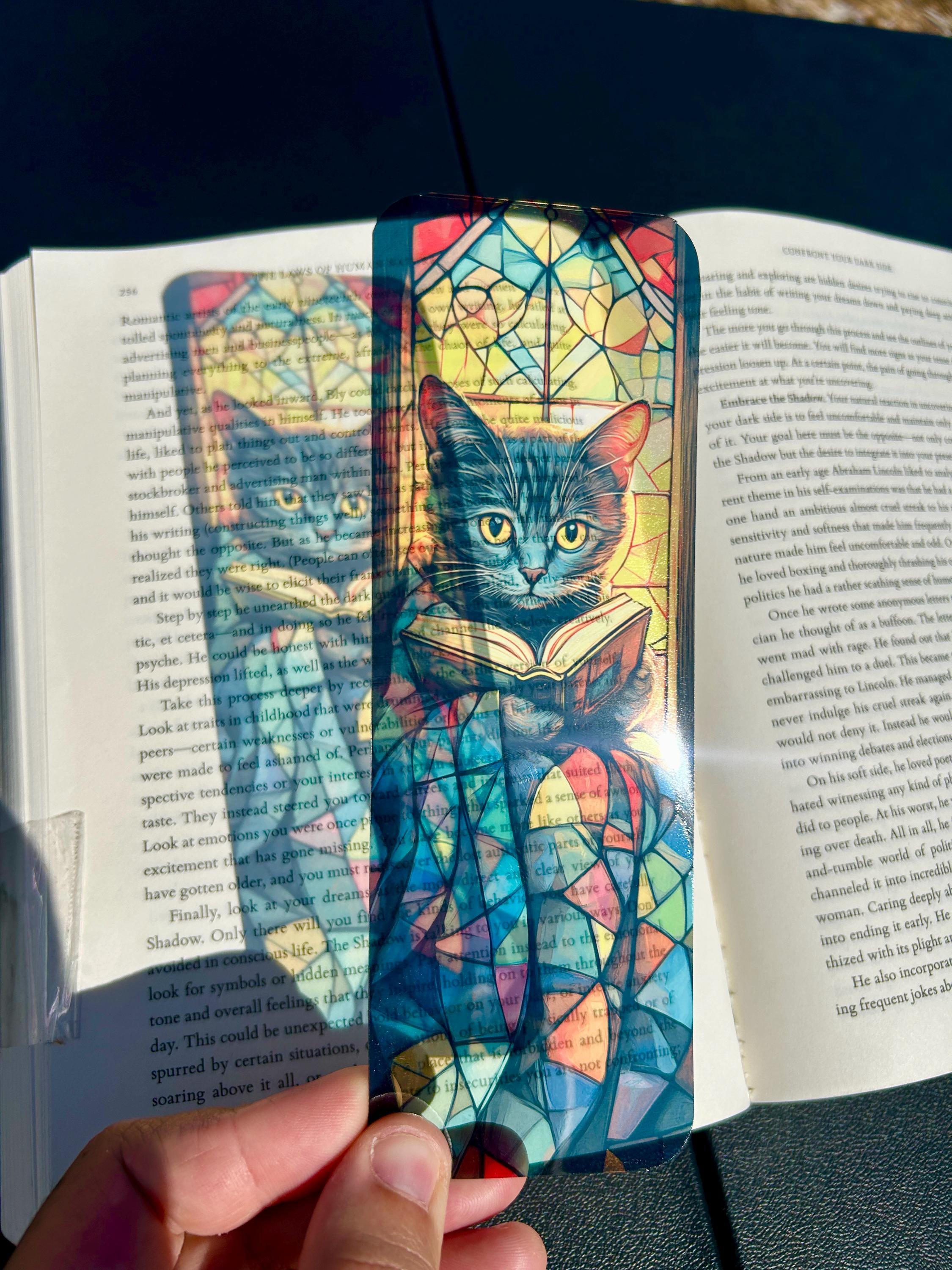 Cozy Black Cat Reading Bookmark with Stained Glass Quilt and Golden Window Glow – Warm Bookish Art for Night Readers, Dreamers